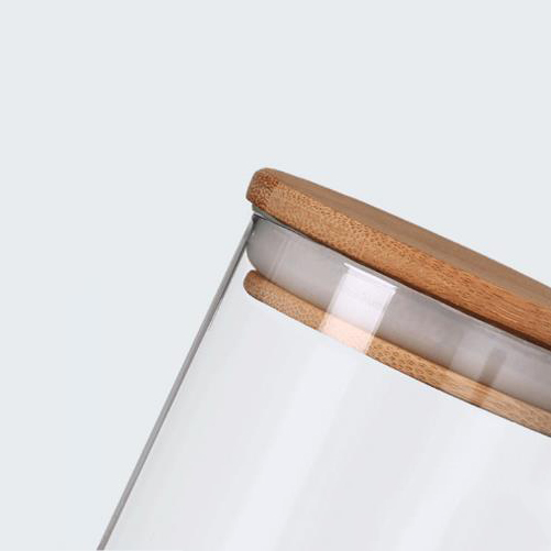 A lead-free sealed food can in glass jar with bamboo lid