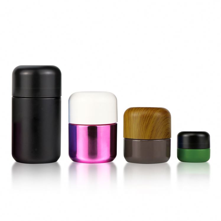 A variety of capacity bamboo cbd flower packaging with child proof cap 1oz 50ml frosted blue glass jar with child resistant cap
