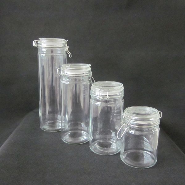 Airtight clear glass storage jars with glass clamp lids