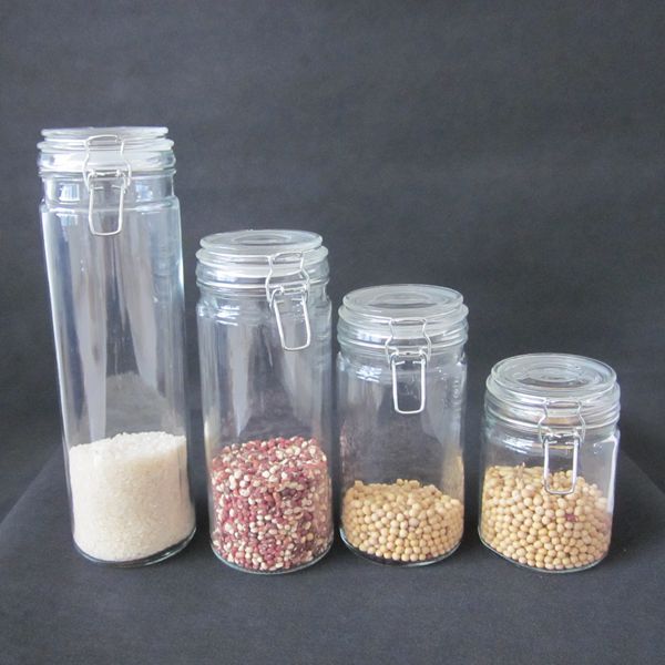 Airtight clear glass storage jars with glass clamp lids