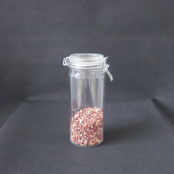 Airtight clear glass storage jars with glass clamp lids