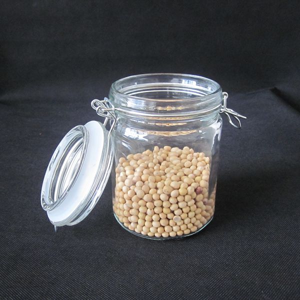 Airtight clear glass storage jars with glass clamp lids