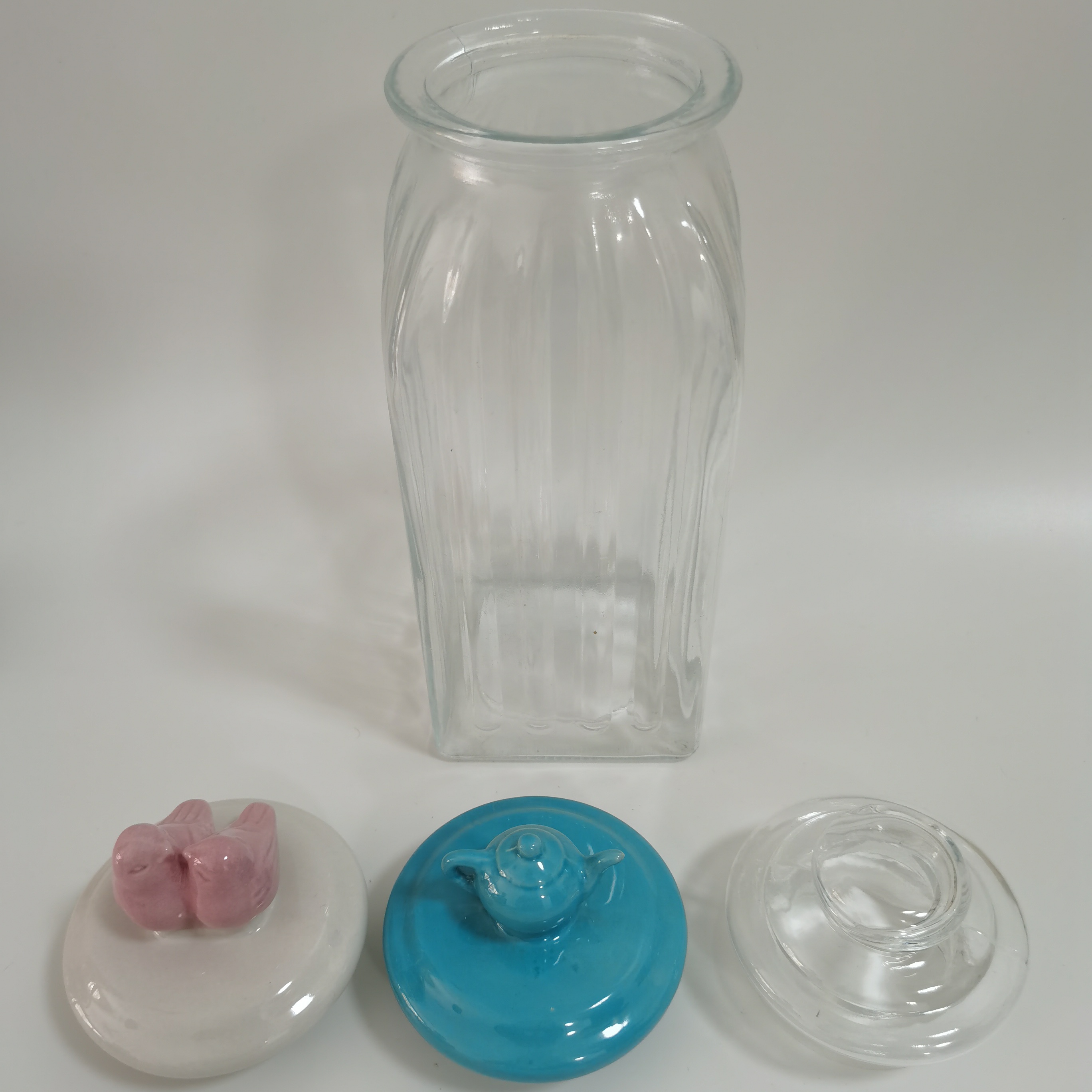 Airtight hot-selling round glass jar with ceramic lids wholesales with flower pattern