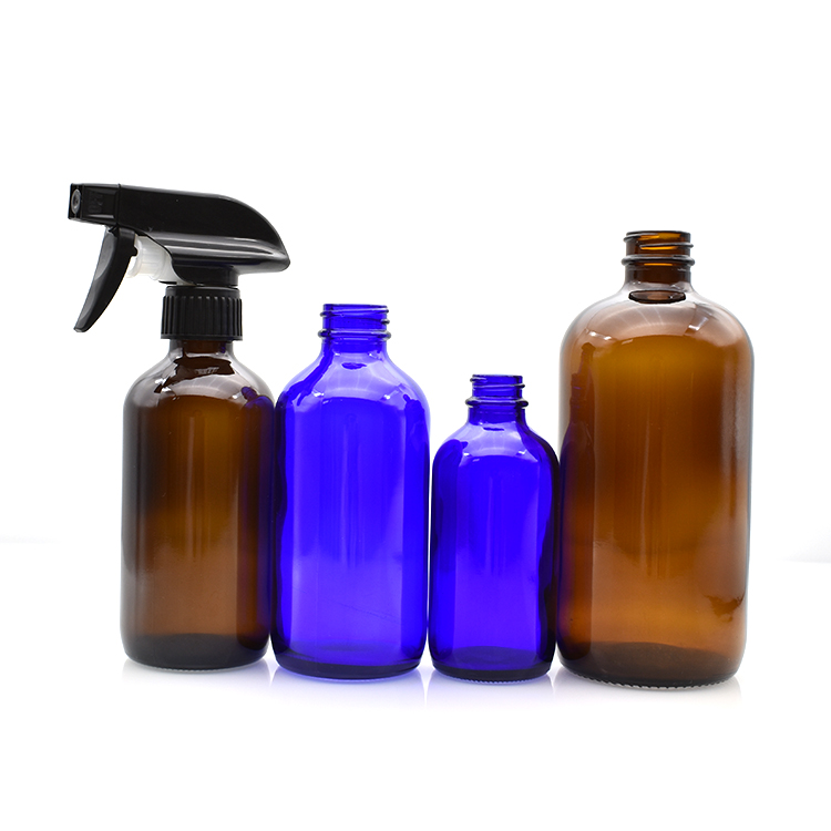 Alibaba China clear blue amber 4oz 1L 16oz boston round glass bottle with trigger spray cap