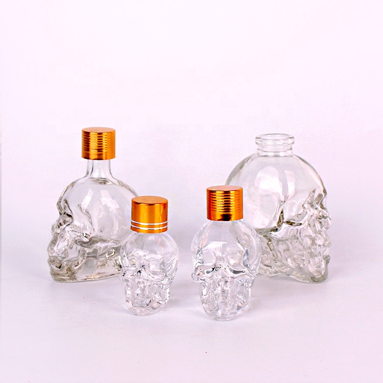 All size clear skull shape glass bottles for essential oil perfume