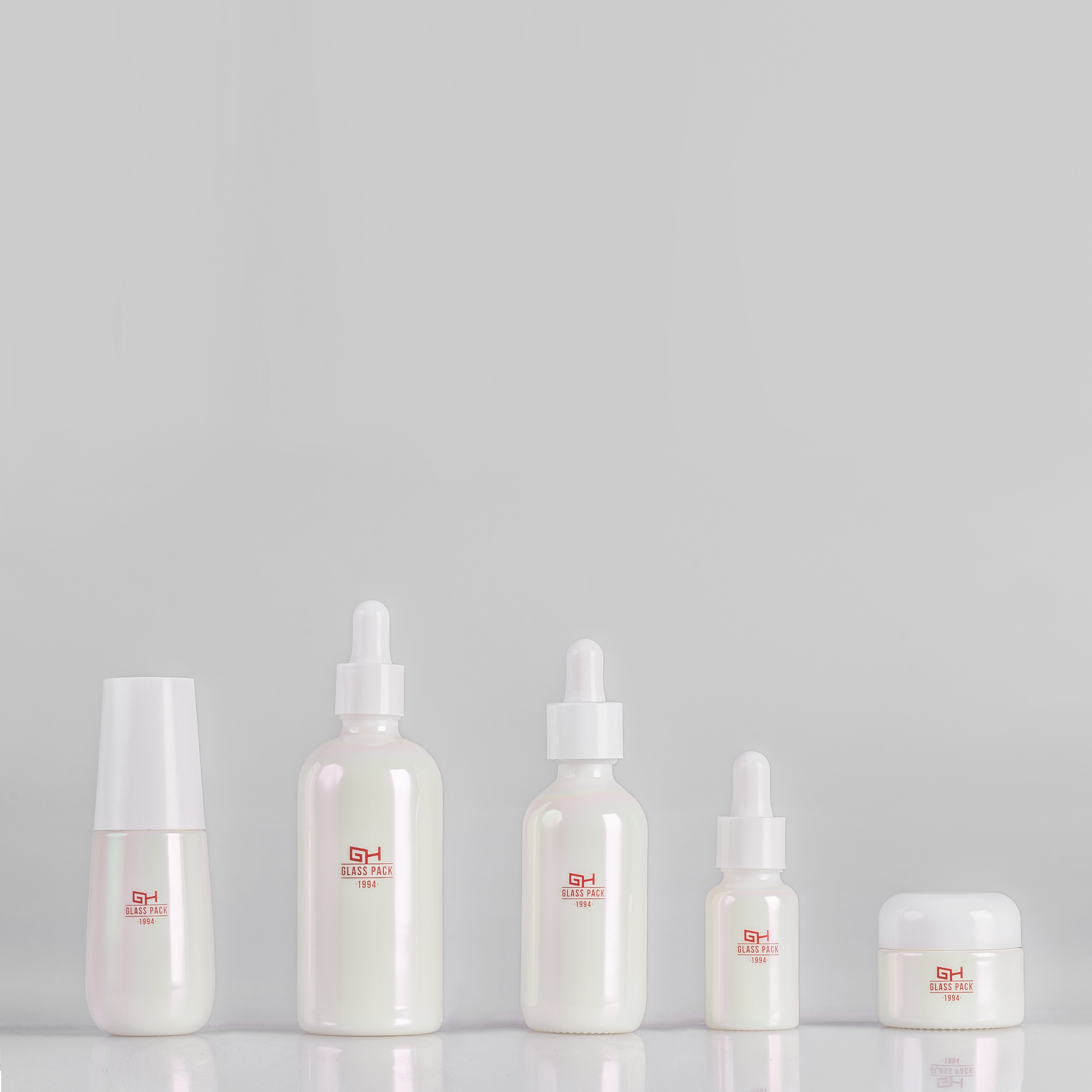 Aluminium coating Empty white opal glass serum bottle and cream jar