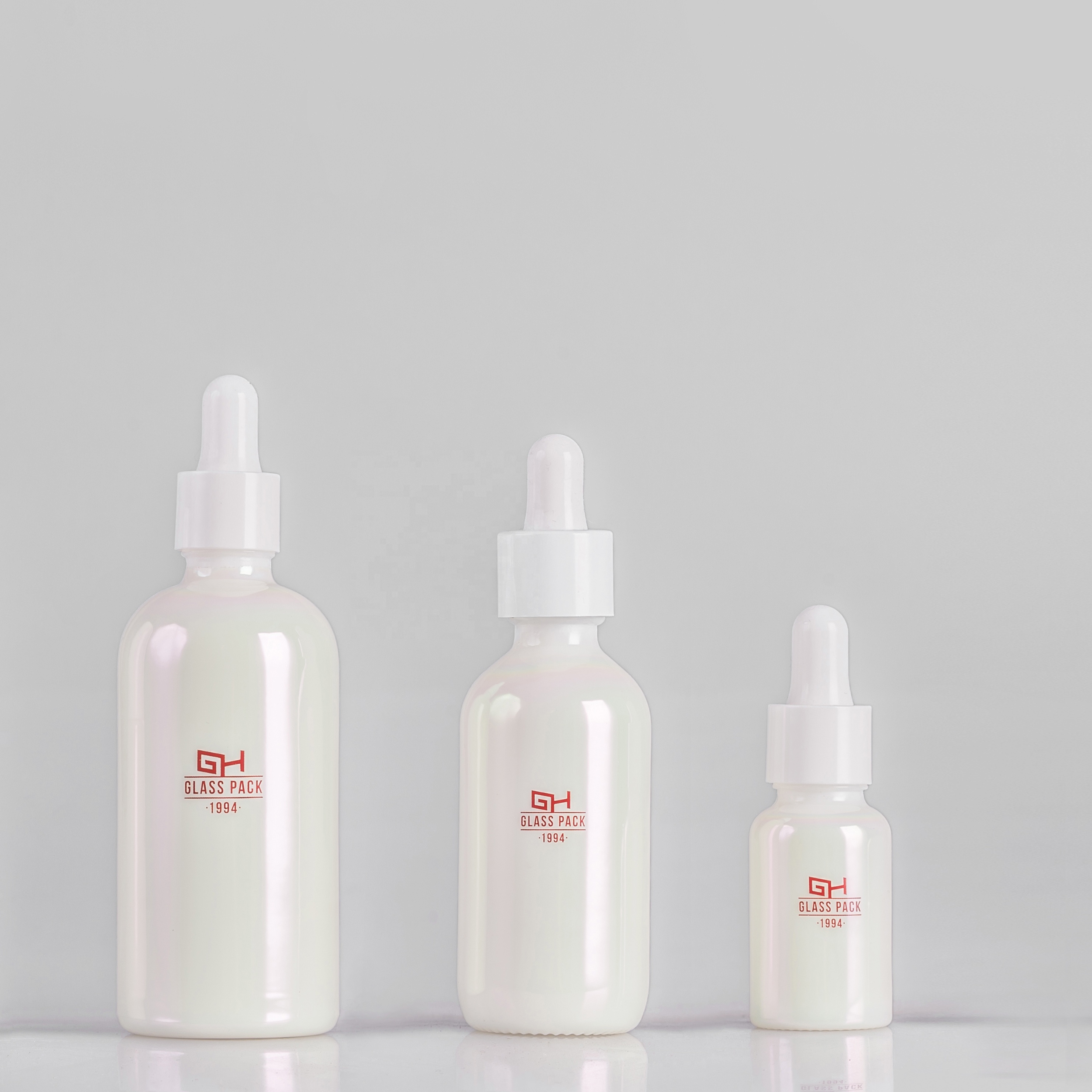 Aluminium coating Empty white opal glass serum bottle and cream jar