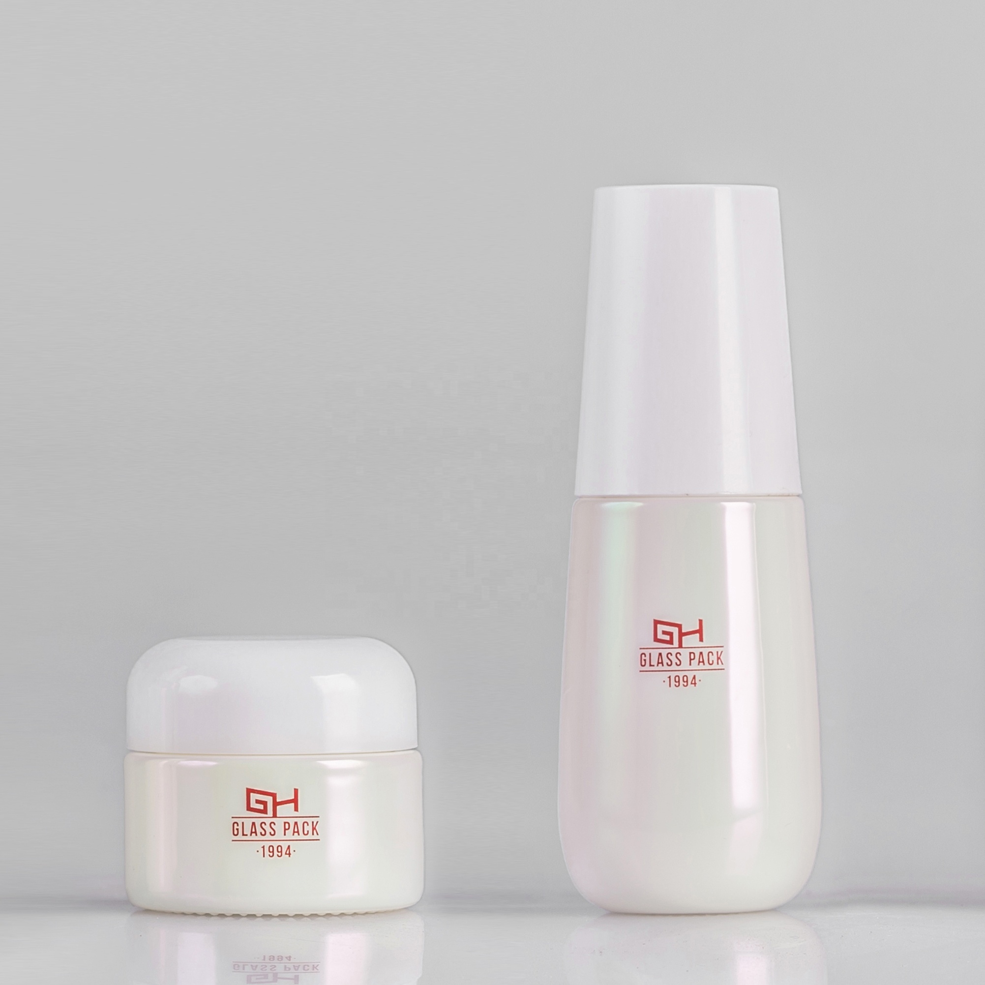 Aluminium coating Empty white opal glass serum bottle and cream jar