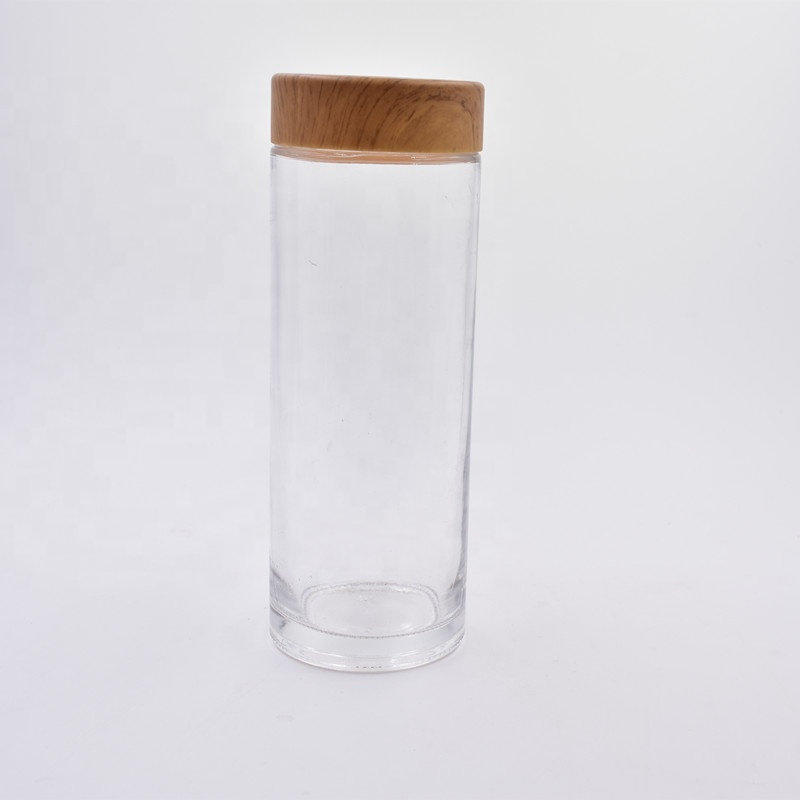 Amazon top seller 750ml clear round glass food storage jars snacks containers canister with screw top plastic Wood grain lid