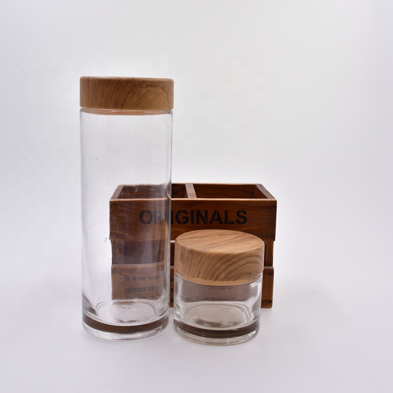 Amazon top seller 750ml clear round glass food storage jars snacks containers canister with screw top plastic Wood grain lid