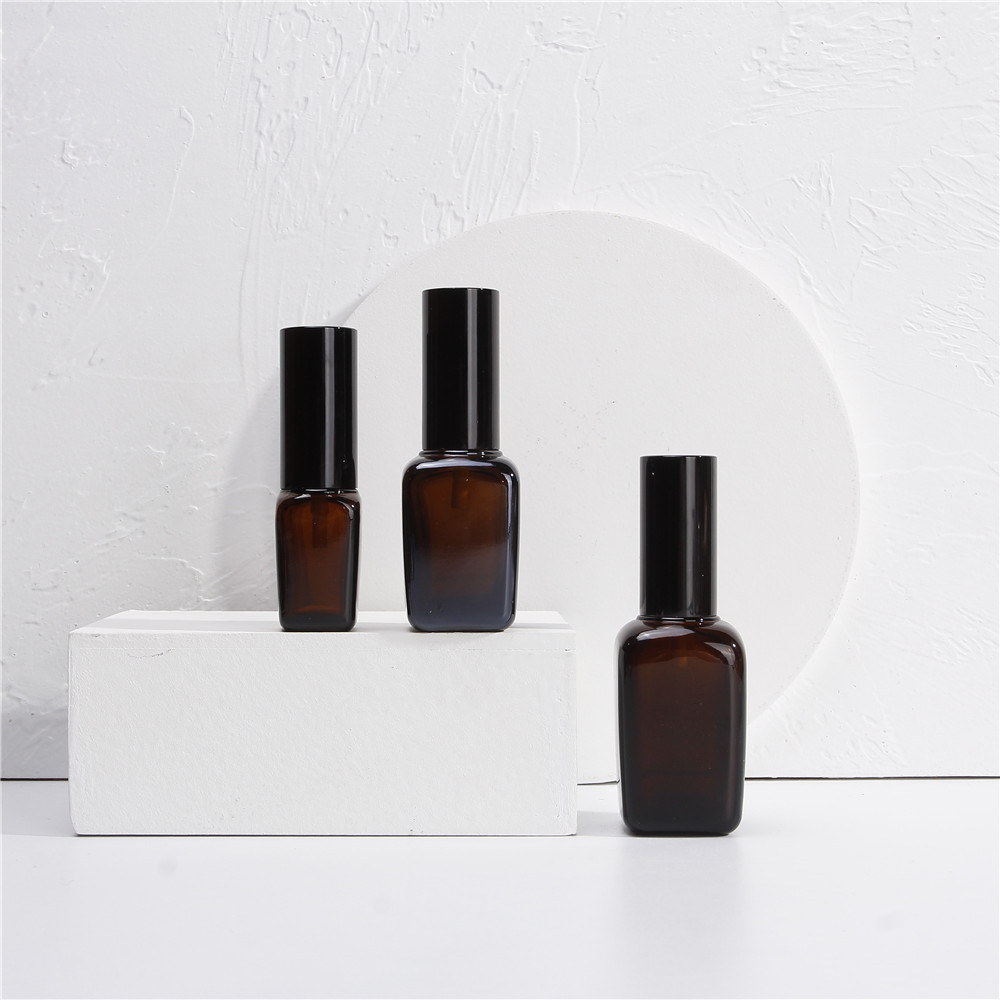 Amber Custom Square Glass Serum Bottle Essential Oil Glass Bottle With Spray Pump