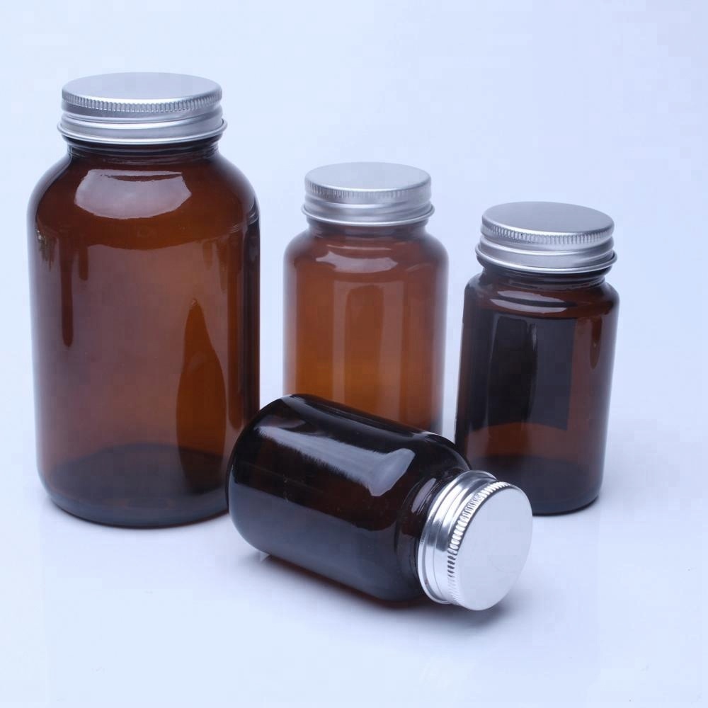 Amber Glass Jars Capsule Bottles With Various Metal Lids