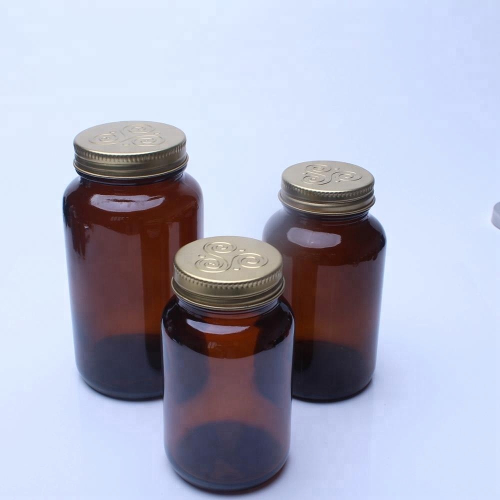 Amber Glass Jars Capsule Bottles With Various Metal Lids