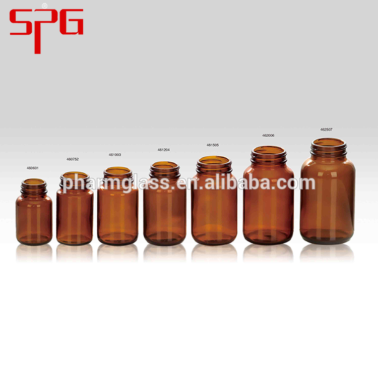 Amber blue green and clear glass bottle for cosmetic and pharmaceutical use