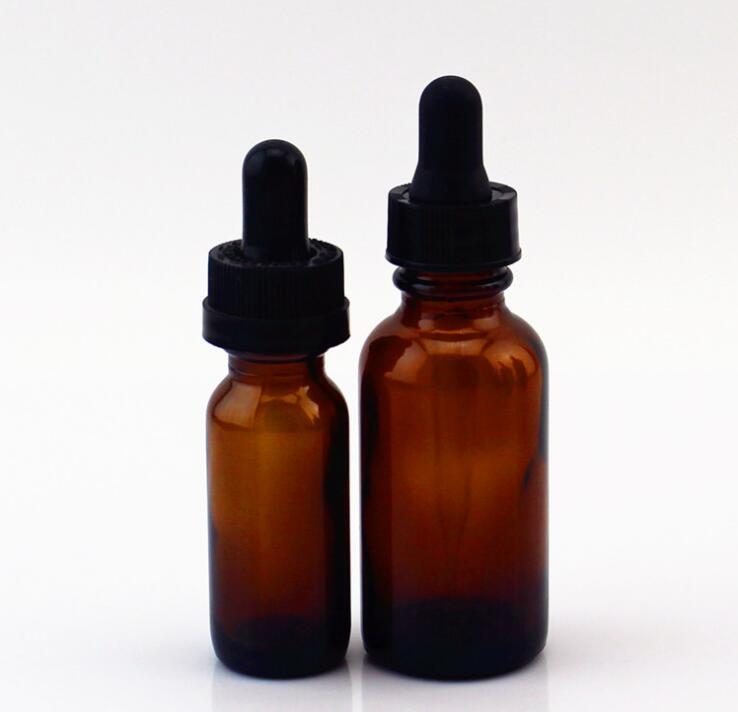 Amber boston glass bottle with dropper pump spray