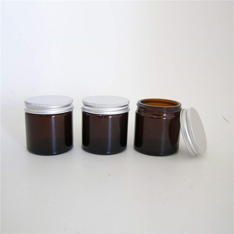 Amber candle jar with metal lid