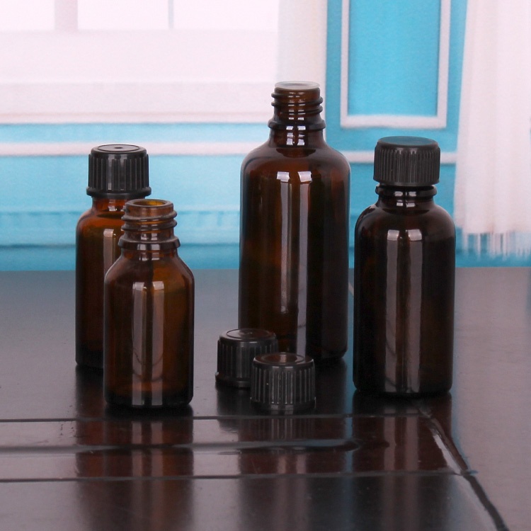 Amber color 10ml 30ml 50ml essential oil packaging bottle glass bottle with plastic dropper