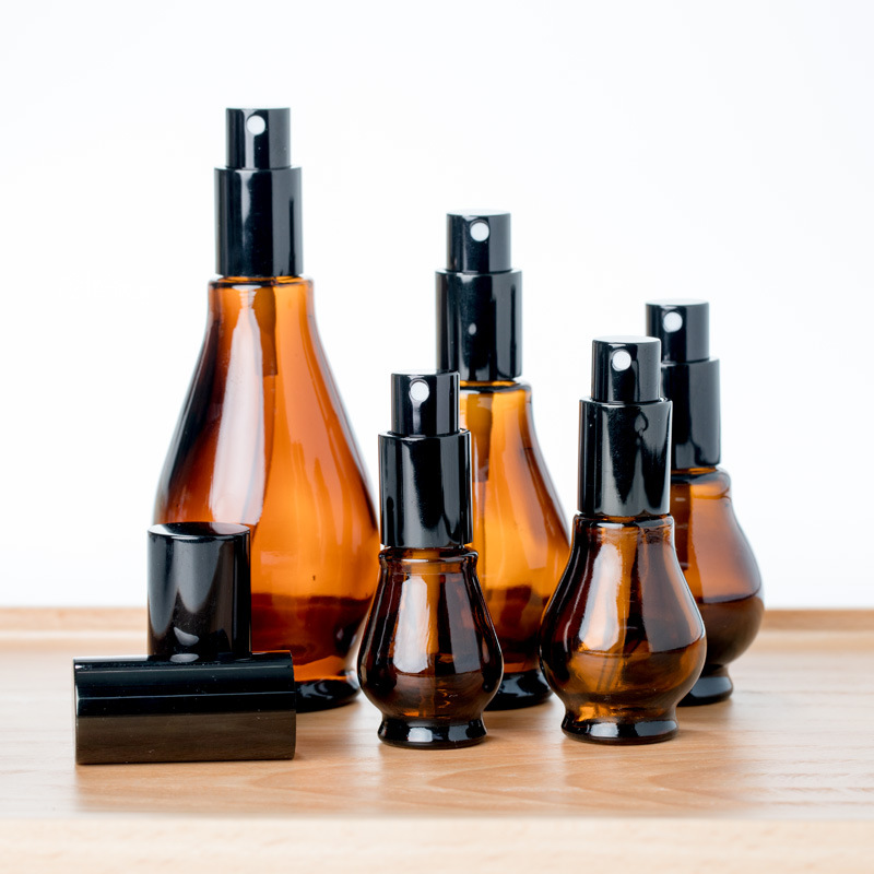 Amber glass bottle with sprayer spray cosmetic lotion pump