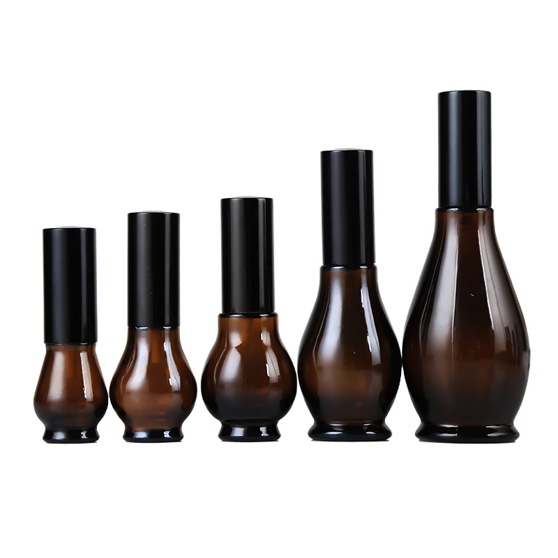 Amber glass bottle with sprayer spray cosmetic lotion pump