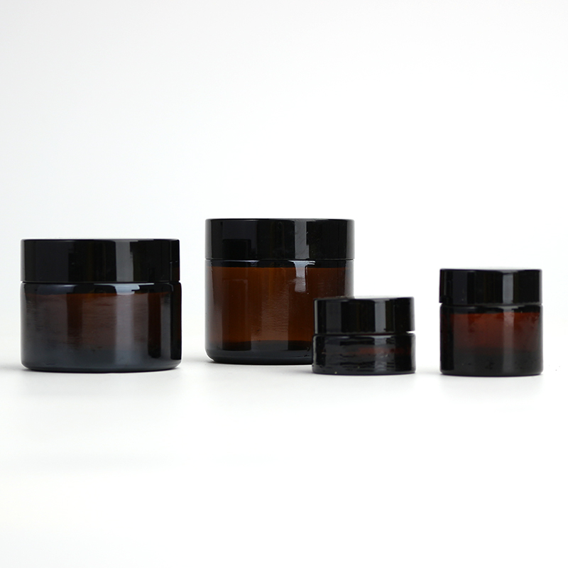 Amber round glass jar cosmetic jar with black lid amber glass cosmetics cream jar