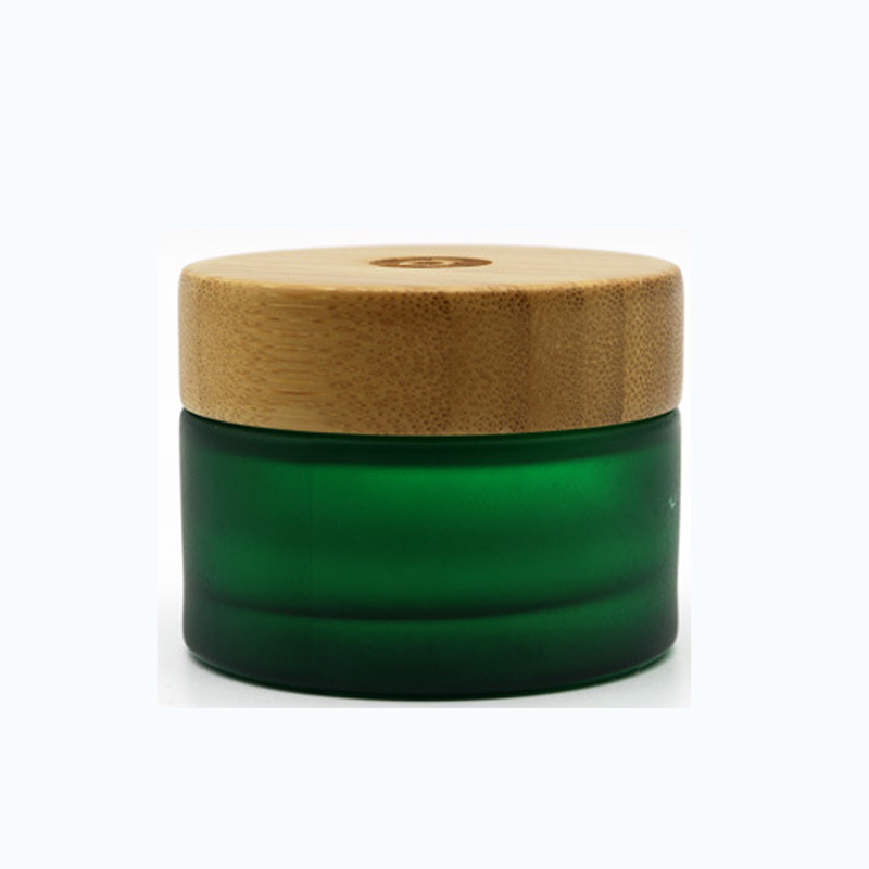 Bamboo containers for cosmetics glass jar 50g clear green glass wooden jar matte frosted green glass jar with engraved logo