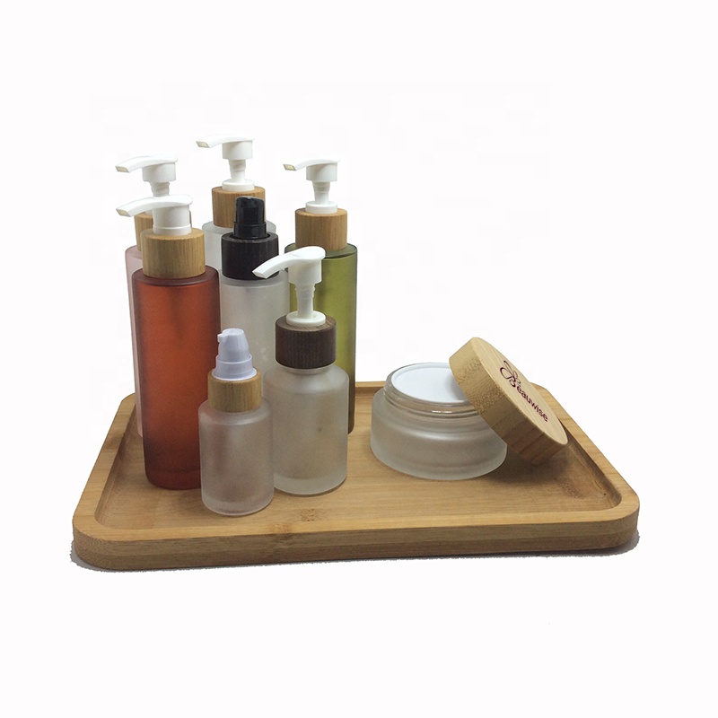Bamboo cosmetic perfume bottle 200ml 50ml 100ml 120ml 150ml frosted glass cream spray lotion bottle with bamboo foam pump caps