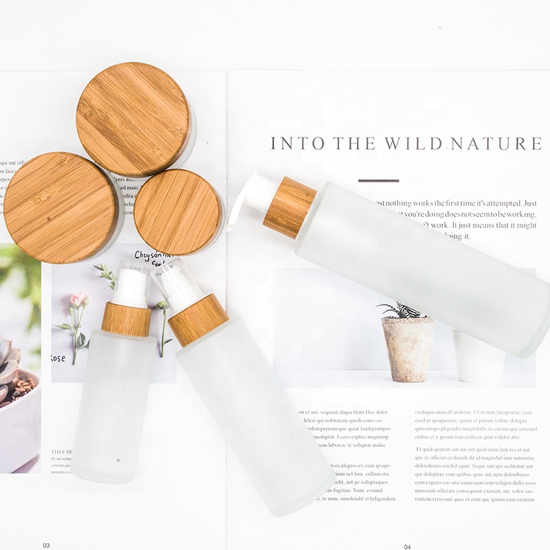 Bamboo cosmetic perfume bottle 30ml 50ml 100ml 120ml 150ml frosted glass cream spray lotion bottle with bamboo foam pump caps