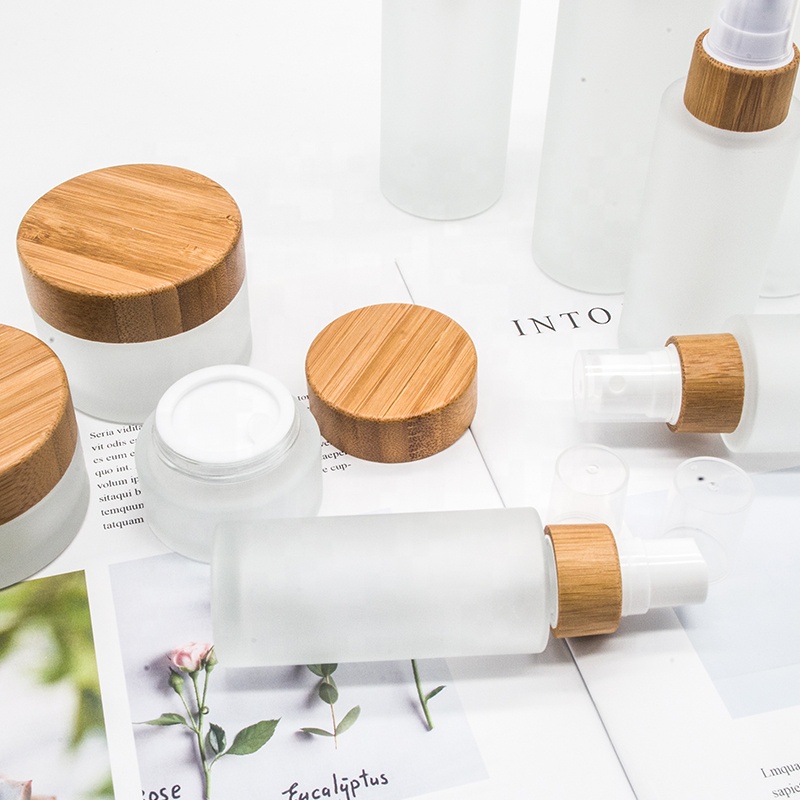 Bamboo cosmetic perfume bottle 30ml 50ml 100ml 120ml 150ml frosted glass cream spray lotion bottle with bamboo foam pump caps
