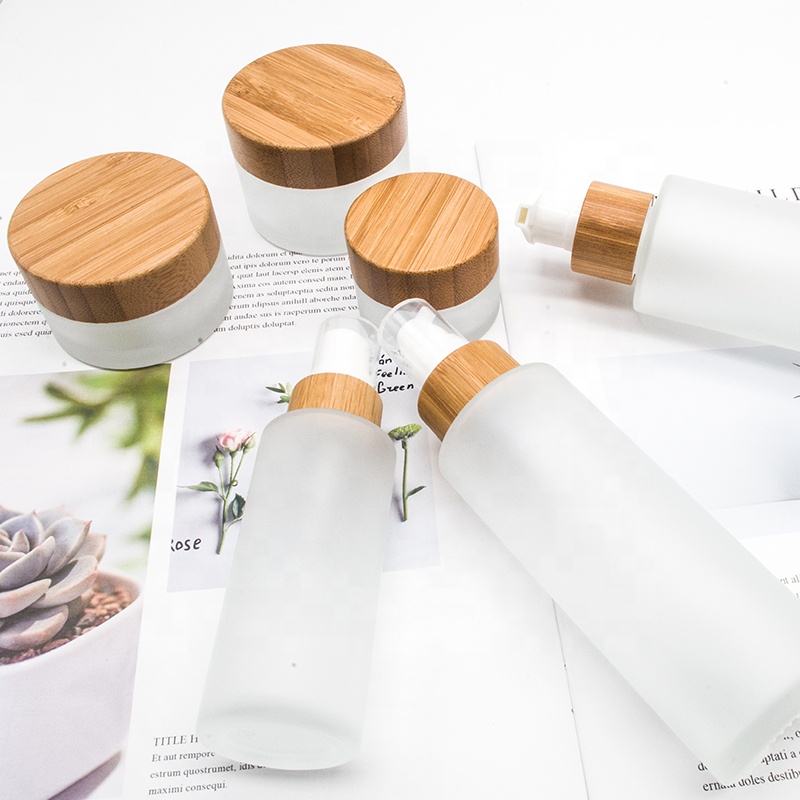 Bamboo cosmetic perfume bottle 30ml 50ml 100ml 120ml 150ml frosted glass cream spray lotion bottle with bamboo foam pump caps