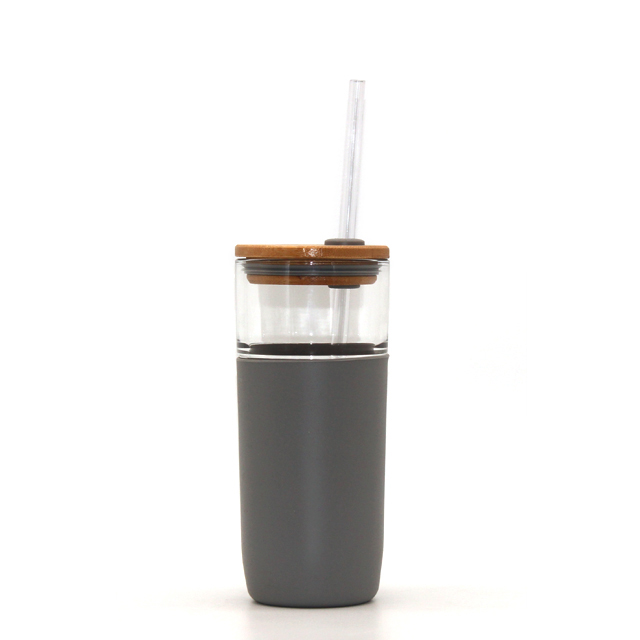 Bamboo lid with silicone sleeve and straw glass tumbler