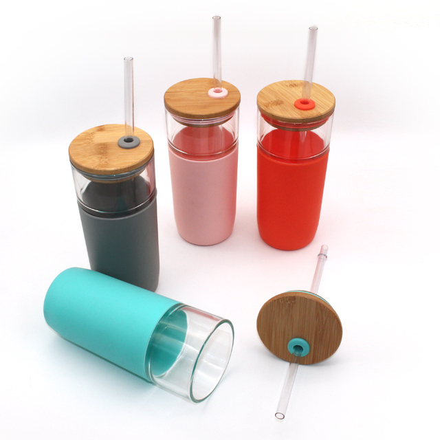 Bamboo lid with silicone sleeve and straw glass tumbler