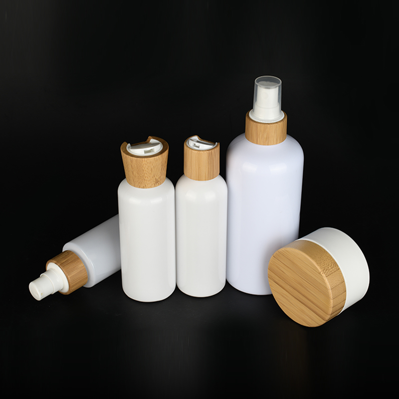 Bamboo series packaging white plastic pump bottles and white plastic cosmetic cream jars with Bamboo lids container