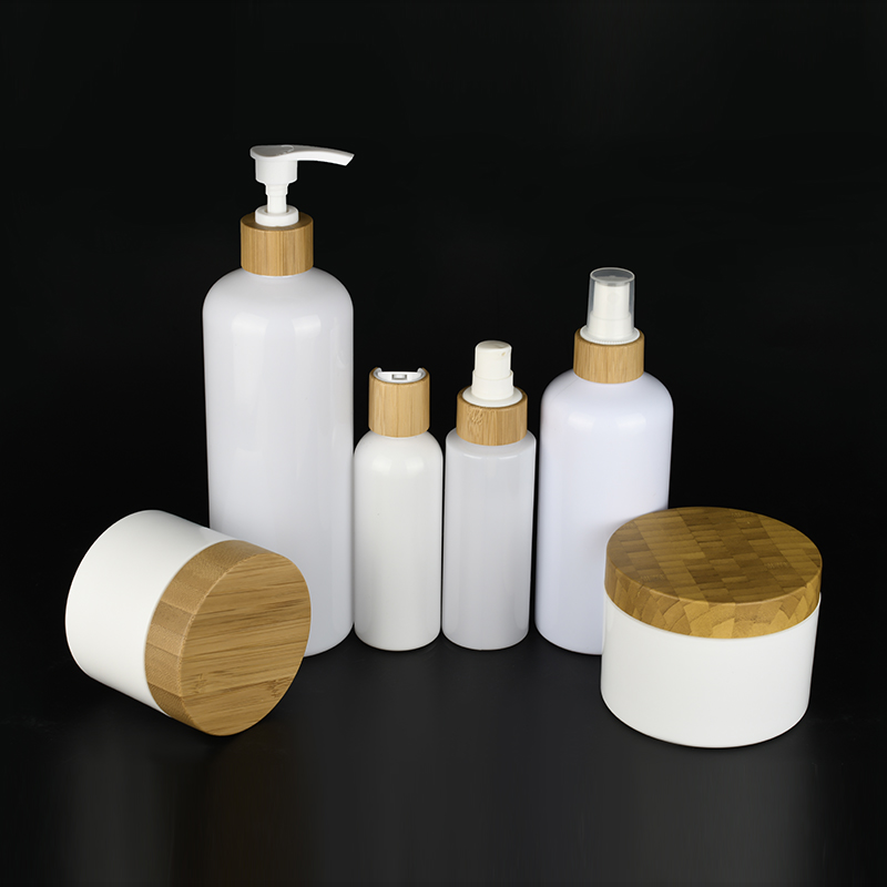 Bamboo series packaging white plastic pump bottles and white plastic cosmetic cream jars with Bamboo lids container