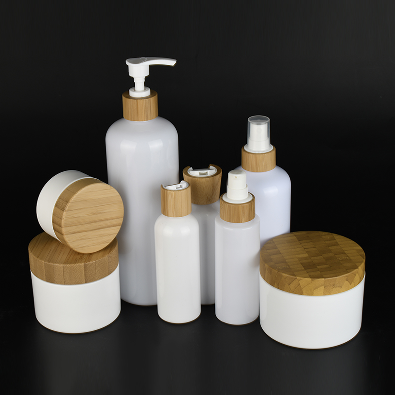 Bamboo series packaging white plastic pump bottles and white plastic cosmetic cream jars with Bamboo lids container