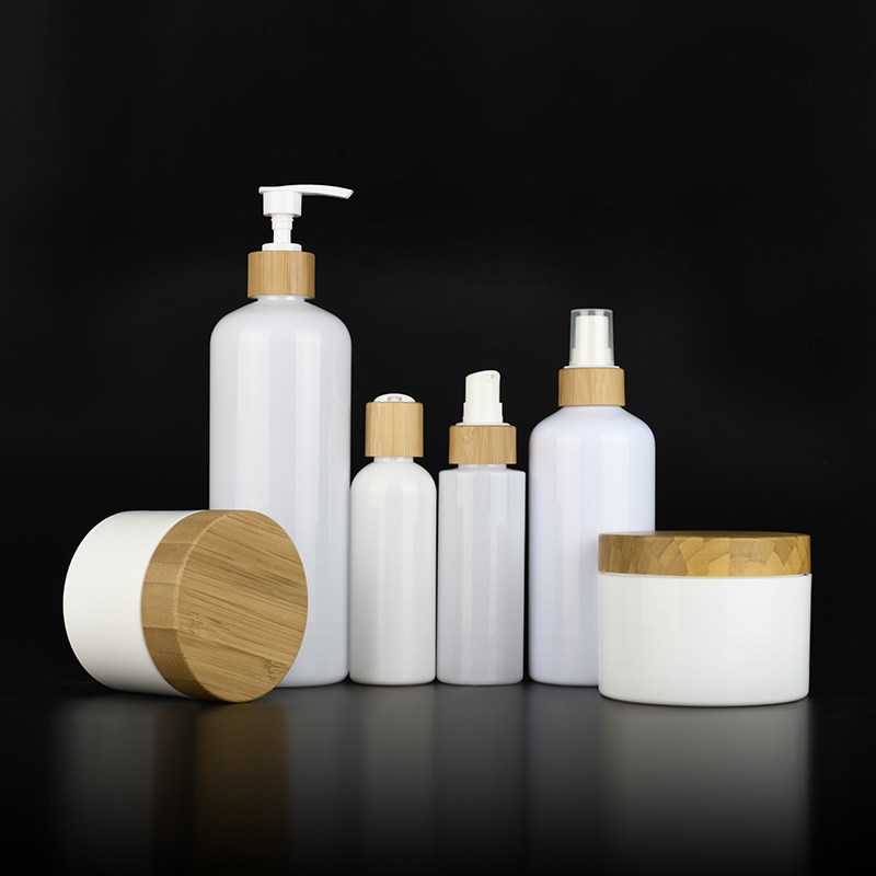 Bamboo series packaging white plastic pump bottles and white plastic cosmetic cream jars with Bamboo lids container