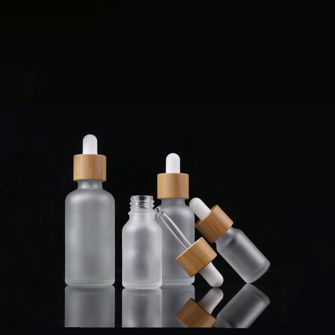Beautiful refillable 15ml 30ml 50ml frost glass bamboo wooden part dropper airless pump bottle cosmetic packaging