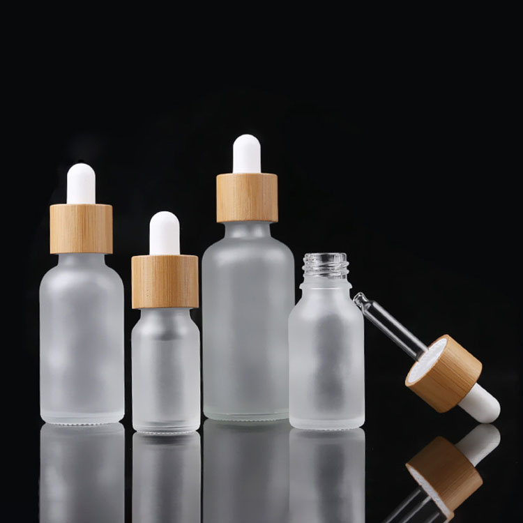Beautiful refillable 15ml 30ml 50ml frost glass bamboo wooden part dropper airless pump bottle cosmetic packaging