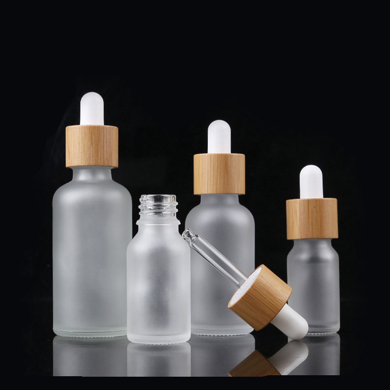 Beautiful refillable 15ml 30ml 50ml frost glass bamboo wooden part dropper airless pump bottle cosmetic packaging