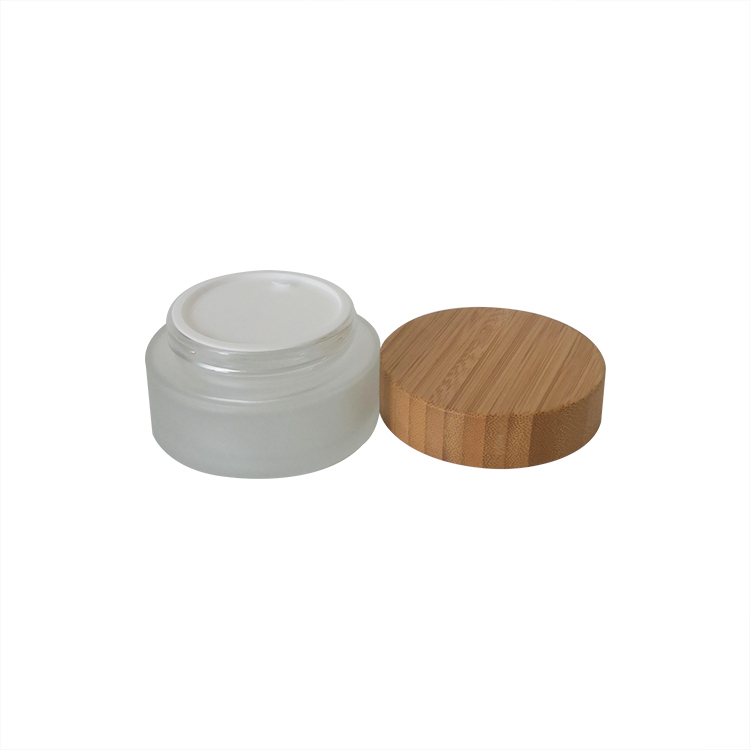 Best price cosmetic 15g 30g 50g frosted clear glass jar for face cream with wood plastic grain lids