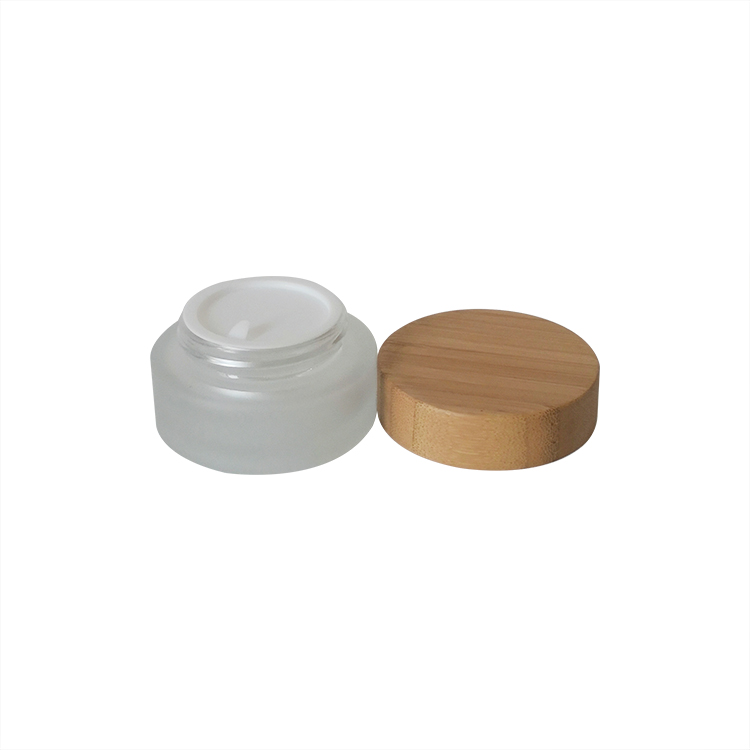 Best price cosmetic 15g 30g 50g frosted clear glass jar for face cream with wood plastic grain lids