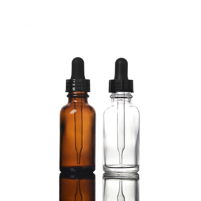 Best quality 1 oz clear color empty boston round glass bottle