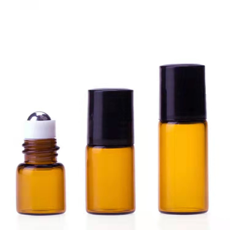 Best seller 1ml 2ml amber/clear colorful essential oil sample traveling glass bottle small brown sample bottle with steel roller