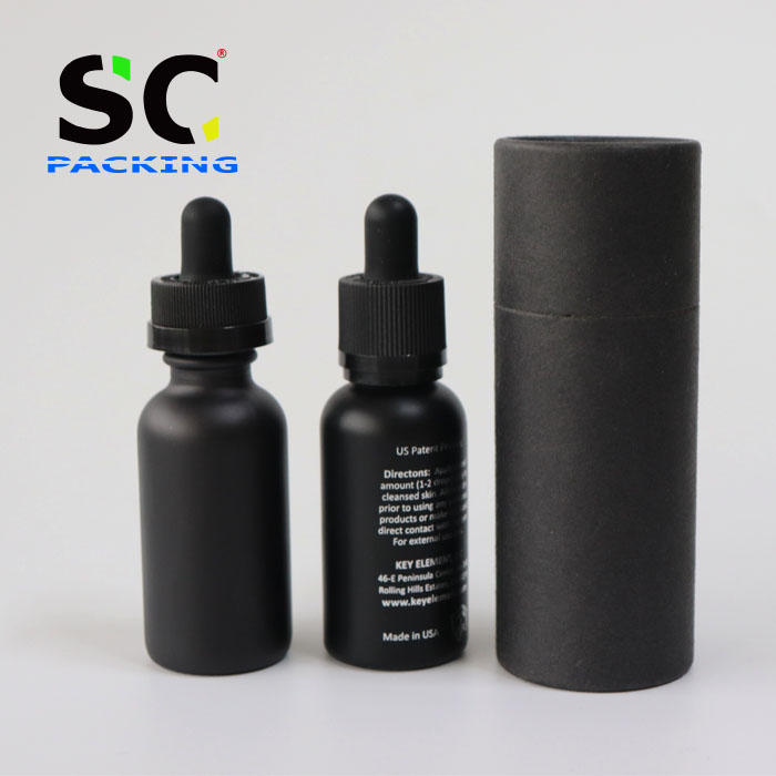 Best selling 30ml black frosted cosmetic bottle essential oil bottle with measurement pipette and paper tube packaging