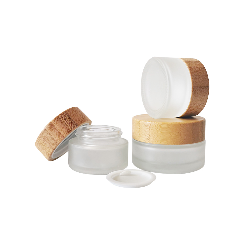 Best selling 5g 10g 30g 50ml 100ml clear amber frosted empty lotion face body glass cosmetic cream jar with bamboo lids