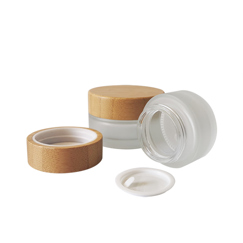 Best selling 5g 10g 30g 50ml 100ml clear amber frosted empty lotion face body glass cosmetic cream jar with bamboo lids
