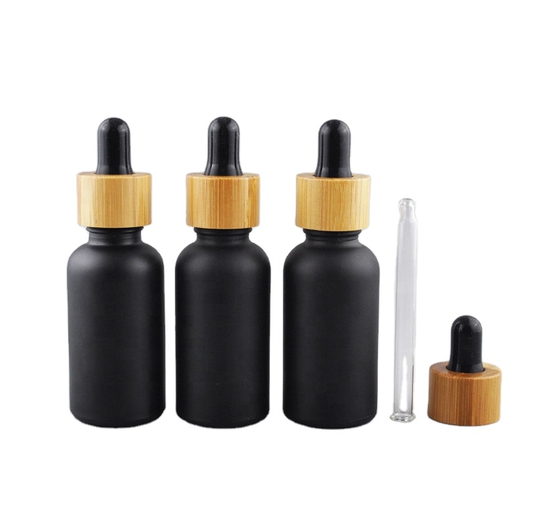 Black Color Coating For Glass Bottle Essential Oil Bottle With Wood Cap For Sale