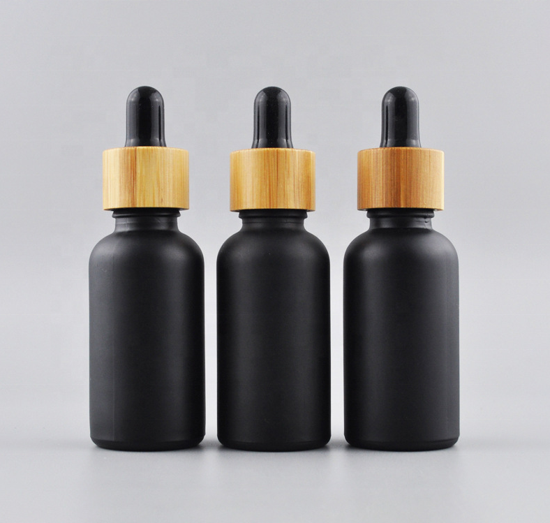 Black Color Coating For Glass Bottle Essential Oil Bottle With Wood Cap For Sale