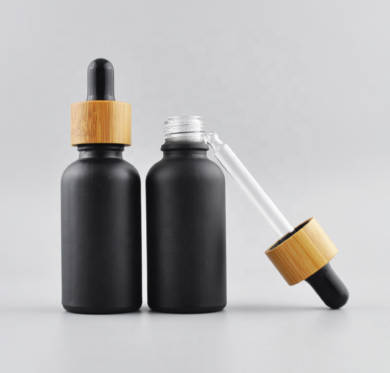 Black Color Coating For Glass Bottle Essential Oil Bottle With Wood Cap For Sale