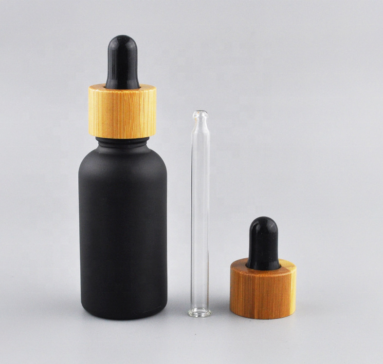 Black Color Coating For Glass Bottle Essential Oil Bottle With Wood Cap For Sale