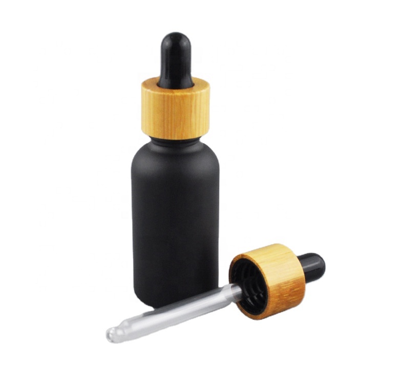 Black Color Coating For Glass Bottle Essential Oil Bottle With Wood Cap For Sale